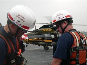 OCMD Paramedics Special Operations in front of Helicopter